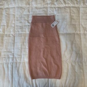 Midi length pink body con skirt